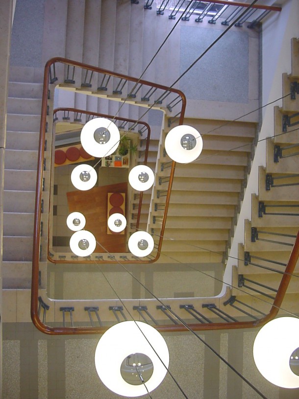 Lamps hanging in stairwell