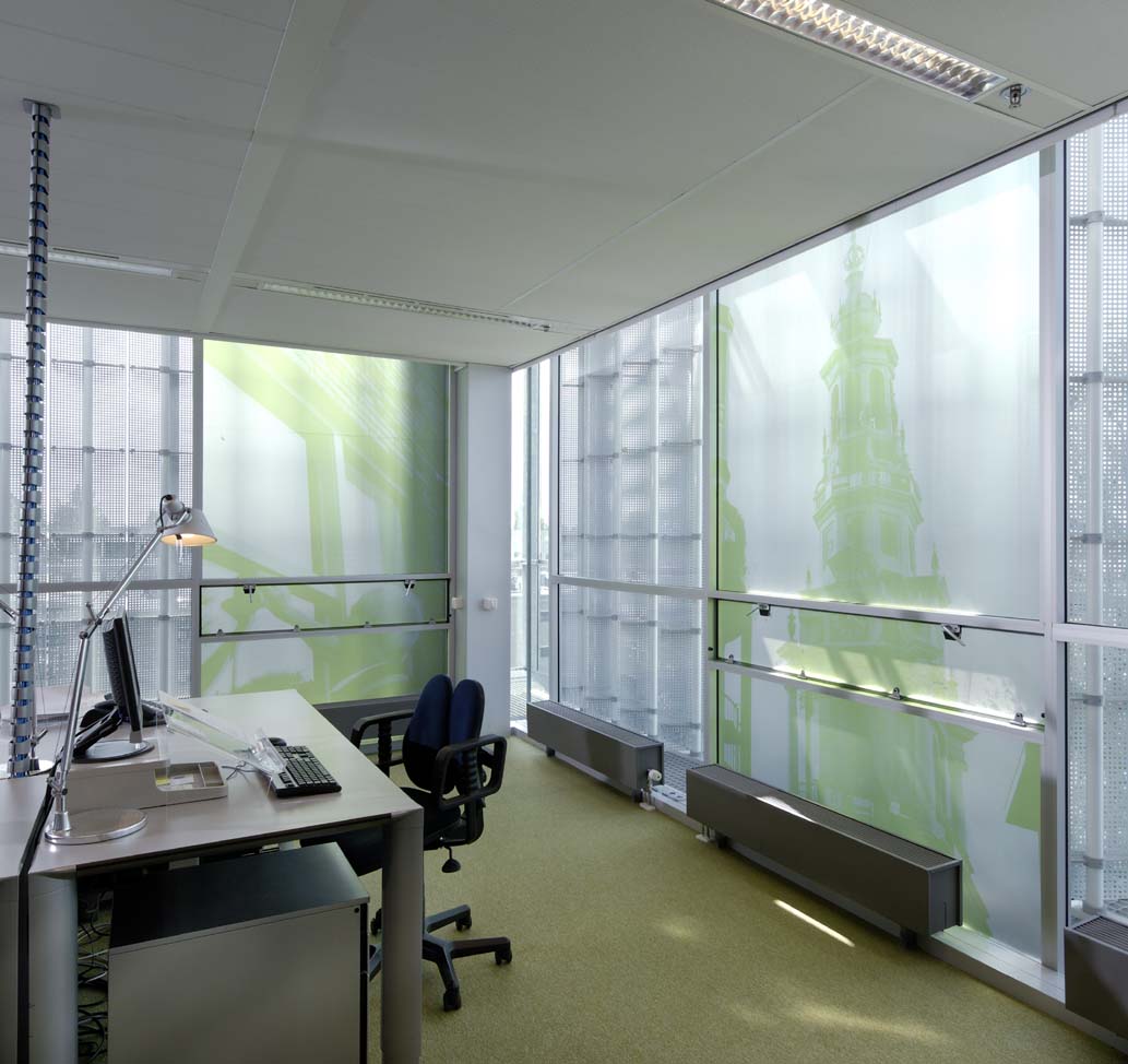 Office with desk and foil on the window.