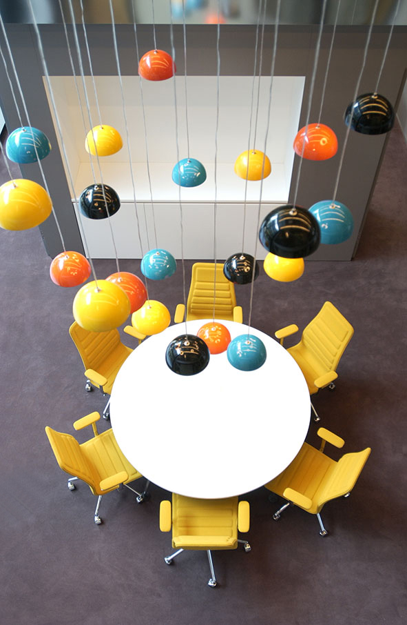 Lamps hanging above round table