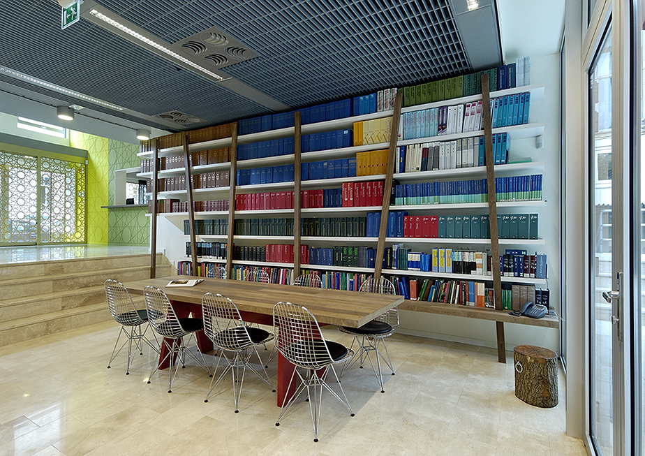 Bookshelves and table with chairs