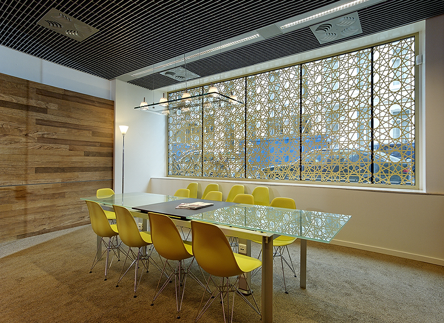 Table with chairs and foil on window