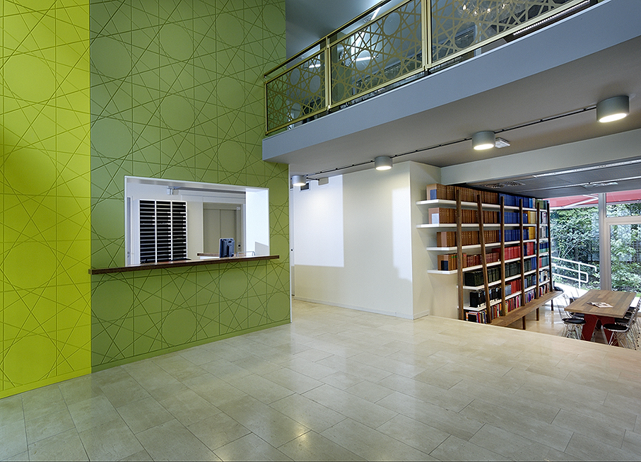 Hall with in the back bookshelves